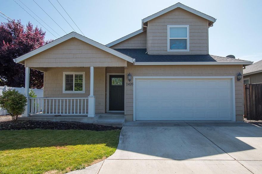 Move in ready 3 bedroom/2.5 bath White City home in desirable Stonefield Subdivision on a cul-de-sac with plenty of parking. Two story home has kitchen with granite counter tops, formal dining room, vaulted ceilings in living room, half bath, and downstairs spacious master bedroom with walk in closet. Sliding glass door in living room leads to fully fenced back yard with patio. Upstairs has two bedrooms and full bathroom. Manicured landscaping in front and back yards with sprinklers. Home also has finished two car garage