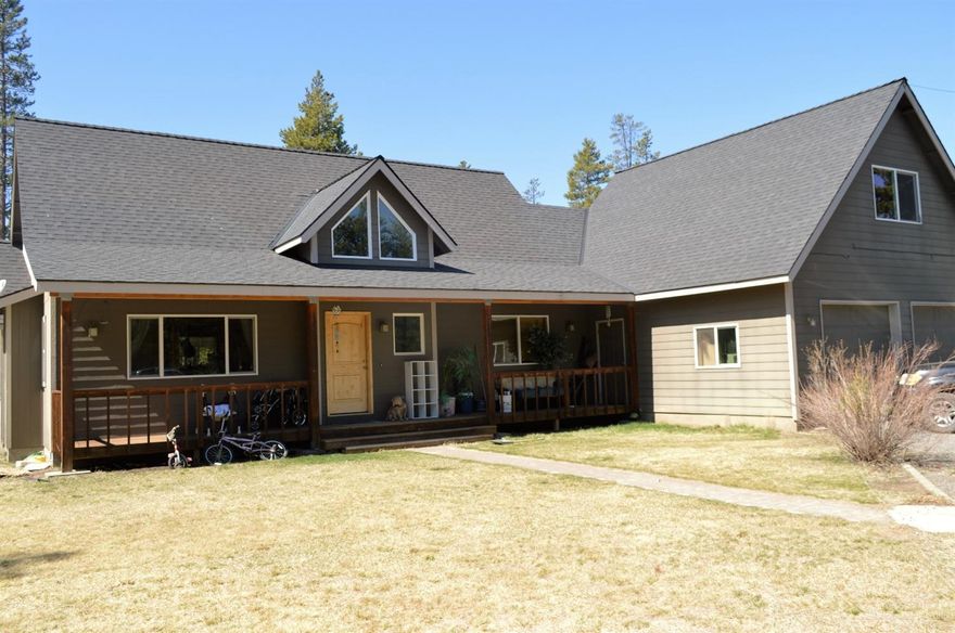 Privacy on 17 acres! This 3 bedroom 2 bathroom home offers an open vaulted layout with front and back covered decks with an attached double car garage on a beautifully treed 17 acre lot.