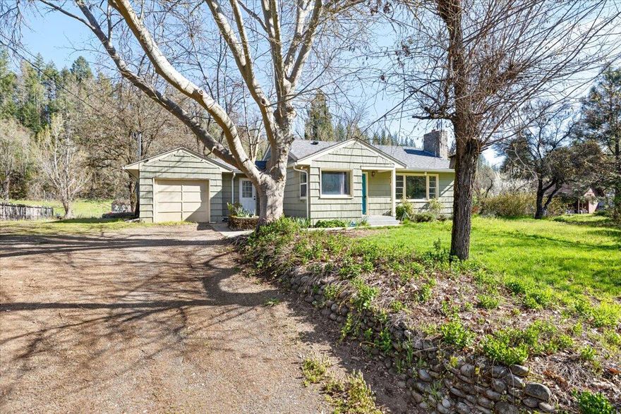 FHA, VA, USDA, Conventional Loans, or cash! this cutie is eligible to finance & under $300K!  Near the Rogue River! with natural light,  sits on a spacious 0.43-acre lot  welcoming place to call home. You'll love the cheerful floor-plan, the generous backyard, & the unbeatable location right across from the Rogue River &Trail Market. Just minutes from Casey State Recreation Site and Lost Creek Lake.  Refreshed in 2017, the home features beautiful wood floors, a newer roof, granite kitchen counter-tops, tile in the bathroom, a sleek quartz vanity, & classic subway tile in the shower. 
This home is so cute! Huge Back yard ideal for relaxing or entertaining. The one-car garage has been thoughtfully converted into a versatile bonus room with an indoor laundry area perfect for a home office, gym, studio, or guest space. 
First home, a peaceful getaway,  or a smart investment, this property offers a rare combination of charm, updates, & location!