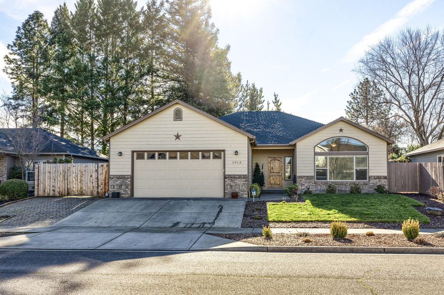 Beautiful, single level home w/huge gated RV parking. Approximately 57' long X 14' wide, all lined with pavers & will fit just about anything you like. Located in the desirable Meadows at Griffin Creek Subdivision. Such a lovely neighborhood. This home is welcoming from the moment you walk up to the solid wood front door. Warm & inviting w/oak hardwood throughout most of the home & tile in the rest. There's 3 bedrooms plus a bonus room near the entry w/glass double doors & a cozy gas fireplace. Open floor plan w/lots of natural light that joyfully beams in the kitchen eating area w/a mod new light fixture. Kitchen features granite counter tops, island w/breakfast bar, newer stainless gas range/oven, dishwasher & microwave approx 1-2 years old, fridge also included! Low maintenance backyard w/a covered patio, garden beds w/drip, fire pit & new fencing. Front yard has new irrigation w/top of the line pipe/fittings used. Lots of storage shelving in garage! Hurry, this one won't last long!