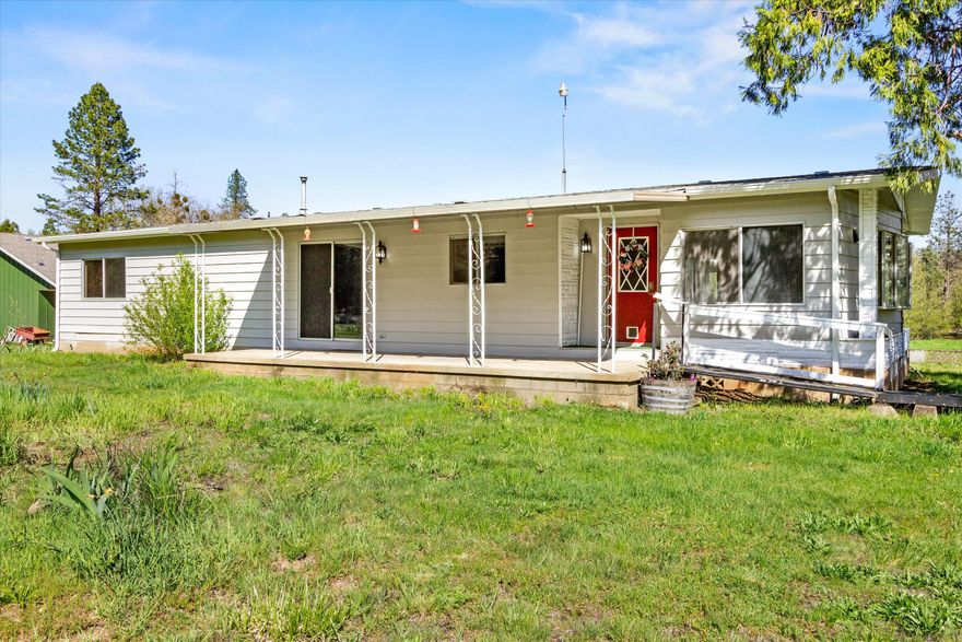 Creek frontage property close to town! Back on the market at no fault of the home. 
This 2.28 acre property currently has a manufactured home with recent updates including new flooring, paint, electrical, bathroom vanity, and more! Live in the manufactured home and enjoy the large, flat, useable lot on Slate Creek, or, build your dream home here!