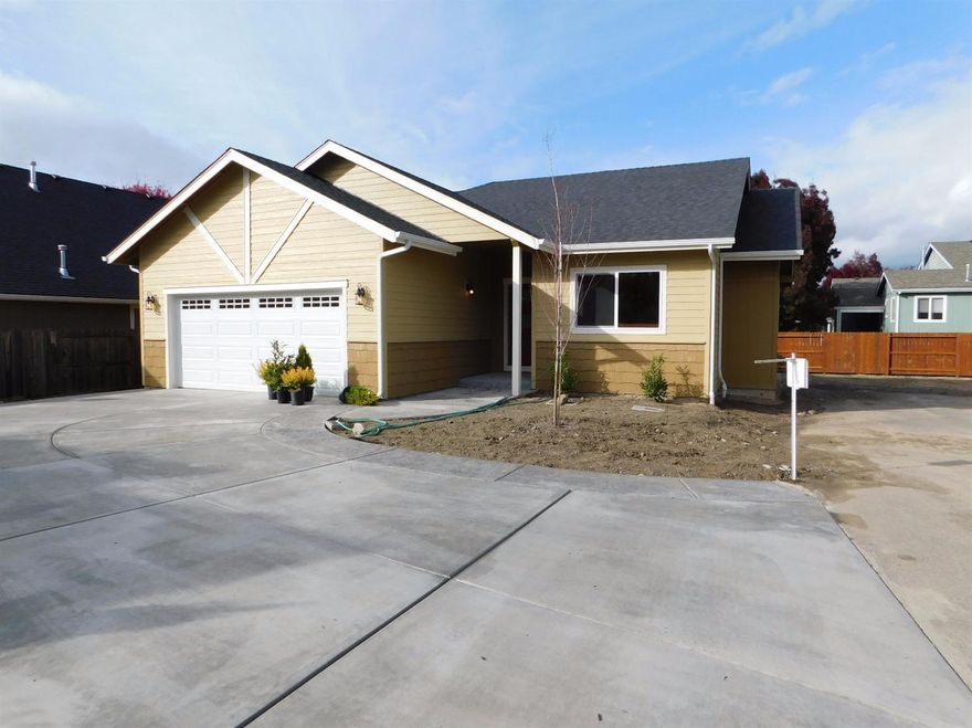 You will love this New Home ready for move in. Developed by Copeland Sand & Gravel, Inc. and built by Charbonneau Construction Ltd. Located close to shopping, medical, schools, parks and the Rogue River, this 3 bedroom, 2 bath home includes finished 2-car attached garages. Kitchen features granite counter tops, plenty of cabinets and pantry, contemporary recessed lighting. Home features natural gas, wood laminate floors, ceramic tile and carpet. Good sized bedrooms and wonderful master suite. Landscaped grounds, fenced, covered patio and exceptional concrete driveway and walkway.