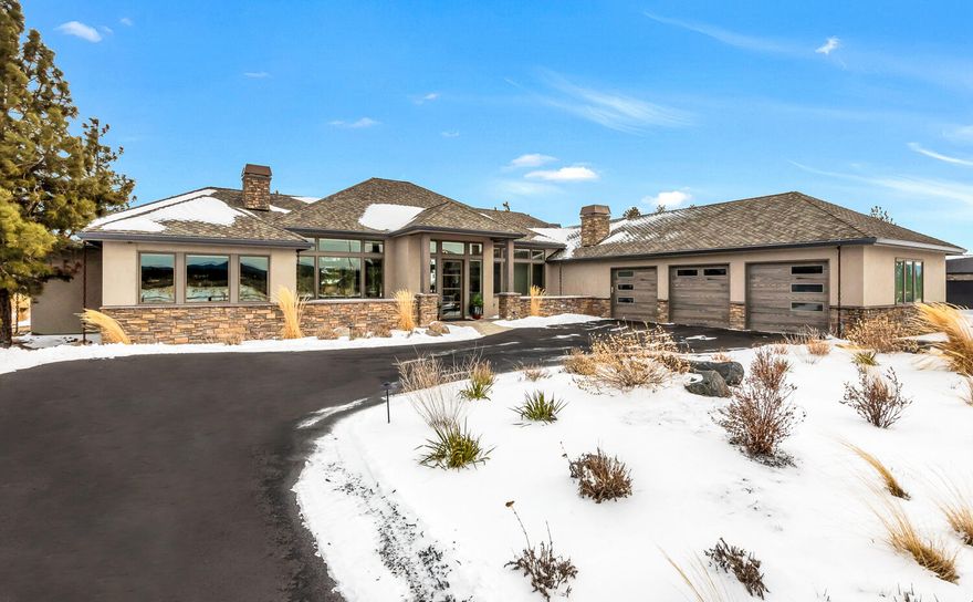 This spectacular, energy efficient, single-level home in Tetherow offers breathtaking, unobstructed views of the Cascade Mountains. The layout features a fantastic separation between the primary suite and two additional en-suite bedrooms, ensuring privacy and comfort. Pet lovers will appreciate the dedicated dog kennel room with a convenient dog door. The spacious laundry room and large office provide functionality for daily living and working from home. Enjoy the convenience of a whole-house smart system that controls blinds, fireplace, and lights with ease. Relax on the back covered patio equipped with a built-in BBQ and fire pit, perfect for entertaining. Built to the highest standards, this home includes double-pane windows and a mechanical air filtration system that filters air eight times a day. Every detail has been meticulously considered.