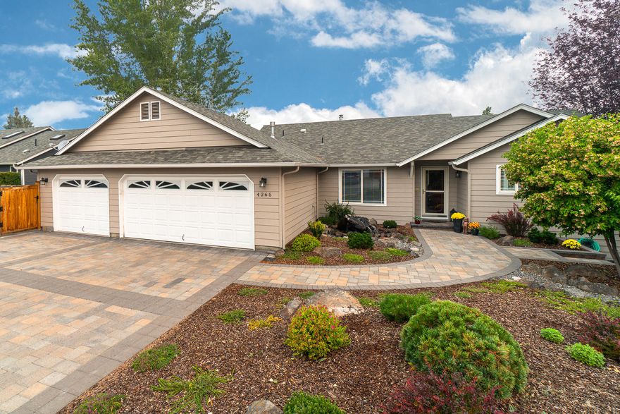 Golf course living w/in minutes of the Redmond Airport & easy access to Bend & local amenities. Overlooking the pond & greens, you'll enjoy this home year round! Great room layout w/huge windows for a light filled home & cozy gas fireplace. Living space extends outside onto paver topped deck & down to a massive paver patio.  Newly remodeled kitchen is a show stopper w/premium custom cabinetry & finishes, including built in breakfast bar & buffet. SS appliances, plenty of storage, pantry & adjoining mud room laundry. Main level Master Suite is one to see! Remodeled bath features a tile shower w/frameless glass door & surround, heated tile floors, double vanity w/Quartz countertop.  Office/den off front entry, hardwood floors on main level w/tile in wet areas. Downstairs is 2 guest rooms, full bath & Bonus Room that could convert to a full 2nd living space. Extra closets & under home storage that dbls as a wine cave. Walk out of the daylight basement to the patio & golf course beyond!