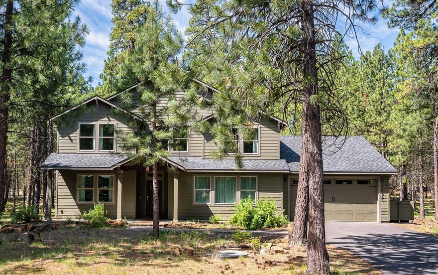 Tucked in a quiet, wooded setting in beautiful Black Butte Ranch, this spacious 6-bedroom, 5-bath home offers the perfect blend of comfort, privacy, and resort living. Just a short distance from the Glaze Meadow Rec Center, the home features an open great room with high ceilings, abundant natural light, and a cozy fireplace. Home includes a generous primary suite, functional kitchen, secondary primary suite on the main, separate dining room, walk-in pantry, laundry, additional living space upstairs, oversized 2-car garage, and a large back deck—ideal for outdoor dining and relaxing among the pines. Enjoy access to Black Butte Ranch's world-class amenities including pools, golf, tennis, pickleball, trails, dining, and more. Located just minutes from the vibrant town of Sisters, this newer home is a rare opportunity, and is ready to be enjoyed year round or as your high desert retreat.