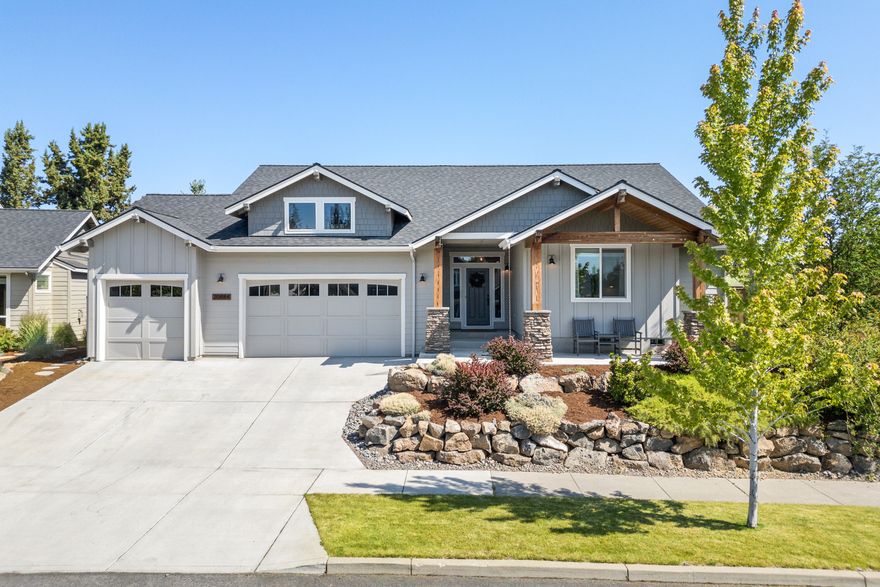 Beautiful single-level home with four spacious bedrooms. Two of these bedrooms have walk in closets. This home has a very open floor plan.The kitchen offers solid surface countertops, a gas cooktop, pantry, and island—ideal for cooking and entertaining. The open living area features a cozy gas fireplace with wood-framed windows. Tile flooring throughout the baths, utility room and walk-in shower. Outside, enjoy the covered back patio in a serene backyard retreat complete with a tranquil water feature and hot tub—perfect for unwinding or hosting guests. Fully landscaped front and backyards with sprinklers. Oversized finished 3-car garage with high ceilings. Just a short walk to Rock Ridge Park!