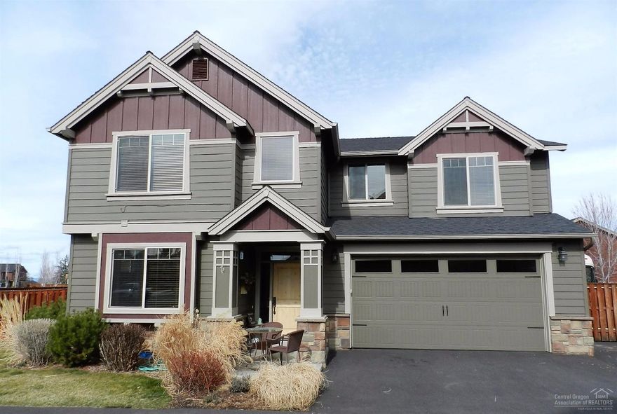 Delightfully maintained home on a fenced corner lot with gated RV parking area. A true 4 bedroom home with 1 bedroom and bath on the main level and 3 addt'l bedrooms and 2 full baths upstairs. The spacious kitchen has a pantry and raised breakfast bar as well as a separate dining are with patio access. Relax in front of the cozy great room fireplace w/stone surround, or soak in the master bath jetted tub. There are numerous upgrades; with all the attention to detail this home is a must see.