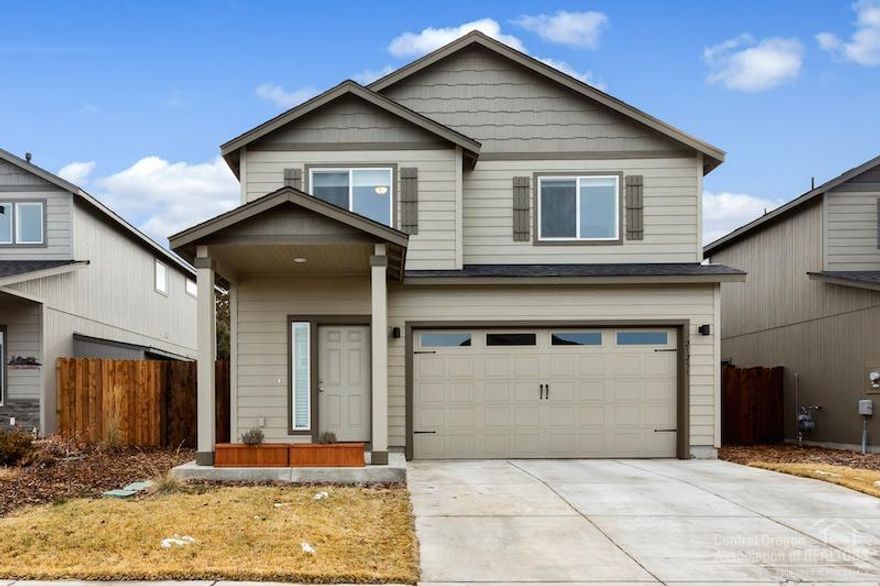 This lovely home is only two years old and centrally located on the Northeast side of Bend, close to all amenities. This home in Monticello Estates offers a master on the main level, gas fireplace in great room/living room, stainless steel appliances, two huge bedrooms and a loft upstairs. The owners have designed a stylish backyard, completely fenced, large patio, a fire pit, and a hot tub, allow for the perfect place to relax. Come see this nearly brand new, custom home!