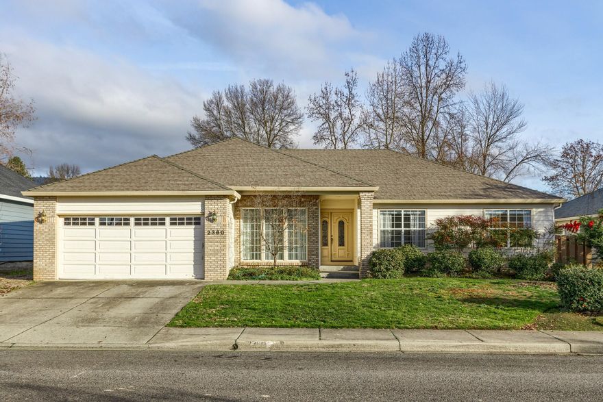 Quality construction in a coveted East Medford neighborhood in Lone Pine school district! 3 bedrooms, 2 bathrooms, and over 1900 sq. ft. of living space. A lovely entry leads to formal dining and living rooms that overlook the front & backyards and host the daylight from floor-to-ceiling windows. At the rear of the home, an inviting, open concept, leads to a covered patio & attractive backyard. Family room w/gas fireplace, cozy breakfast nook w/bay windows, and well-designed kitchen w/updated stainless steel appliances & extensive cabinetry. Master suite features dual vanity, tiled shower, spacious walk-in closet, recessed ceilings, and slider to its own covered patio. Well-appointed built-ins for storage throughout home. Indoor laundry. Central vac system. 90% efficient gas water heater. Dual fuel heat pump w/90% efficient gas auxiliary heat. Furnished with ALL appliances and window treatments. Lovingly maintained and move-in ready, w/carpets freshly cleaned on listing day!