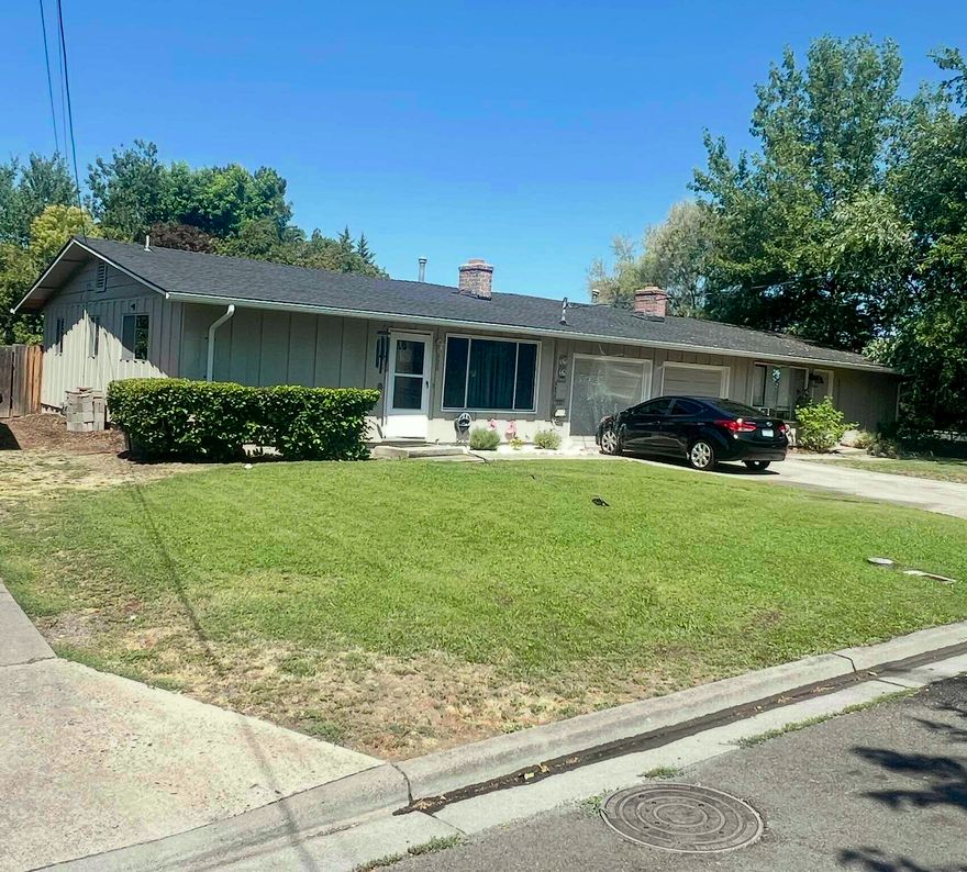 Classic 1961 duplex with great curb appeal in Asante neighborhood. Each 2BD/1BA unit includes a single-car garage, mature landscaping, and private front entrances. Located near Larsen Creek walking path,  this 2,092 SF property features gross modified leases with long-term tenants — one since 2005, the other since 2022. Separate gas/power meters, no HOA, and professional management in place.  Roof replaced last year. Quick access to Rogue Regional Medical Center, the airport, and I-5. A stable, turnkey investment opportunity.