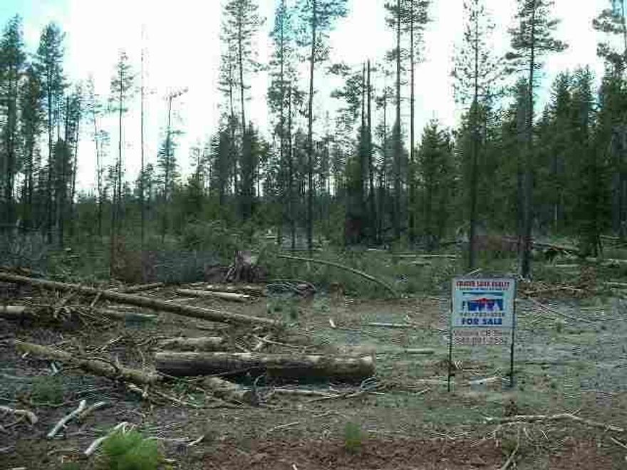 More Than 1 And 1/2 Level Acres In Mt Scott Meadows. Close To Hwy 97 For Year Round Access. Very Pretty Area With Lots Of Pines, Wildlife, Peaceful Country Living. Clearing In Progress, Tons Of Firewood!