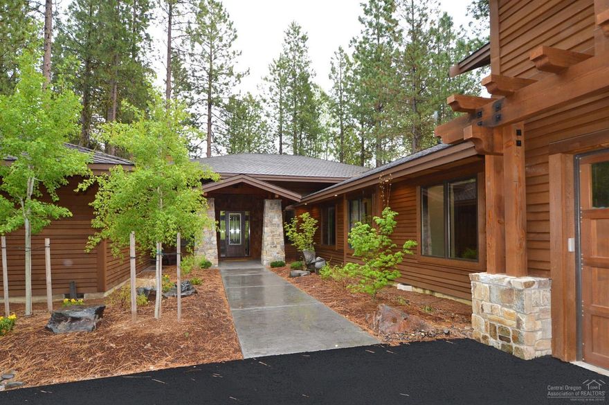 A stunning Northwest crafted home with a great room concept,large fireplace,large deck with sweeping views of the golf course(Big Meadow #12),and Beaver Pond. Master suite on the main floor and 3 additional bedrooms and baths. Large bonus room to complement the 3612 Sq. Ft. two year new home! The finest of finish materials and top of the line appliances. This is a turnkey property, completely furnished. Short walking distance to the Paulina Springs pool and tennis courts. This property is the complete package.