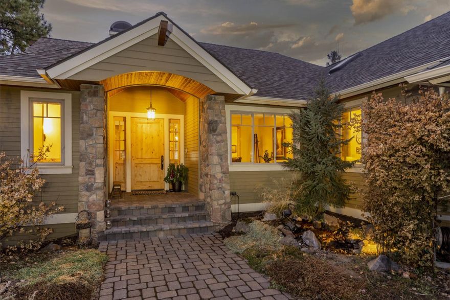 From its easy access to trails to its peaceful location among the tall pines in the Reserve at Broken Top, this Pacwest home truly embodies the Bend lifestyle. Upon entering, you'll immediately notice the elevated forest views through the expansive windows. Enjoy quiet mornings with nature on the large deck along the back of the home. Inside, the updated kitchen is a chef's dream, featuring a huge island and breakfast bar, suede quartz countertops, and a 48-inch gas range with griddle. At the other end of the home, the owner's retreat offers forest views and an incredible, updated bathroom with custom soaking tub, walk-in shower with solatube, and radiant floor heating. A second full suite, office, and a large laundry/mudroom leading to the oversized 3-car garage are also on the main level. Downstairs, sports and movie fans will love the media room, complete with reclining seating for 8. Access the patio & hot tub from the media room. Live the Bend life to its fullest in this stunner!