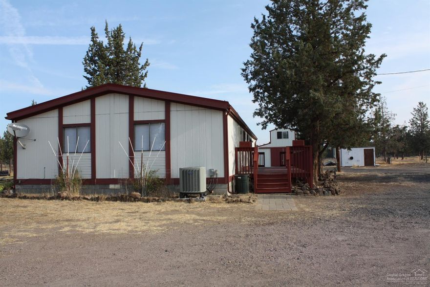 Come enjoy this newly updated home! Inside has new paint, carpet & blinds.Large kitchen with island, pantry & built-in hutch. Vaulted ceilings with multiple windows & skylights that provide natural lighting throughout the home. 4.79 acres of desirable horse property fenced & cross-fenced & includes a 24 x 36 drive-thru barn that opens into the pastures. Both front & back decks have been recently refinished. Full circle driveway. Bring your horses, ATV's & RV's, lots of room for your toys!