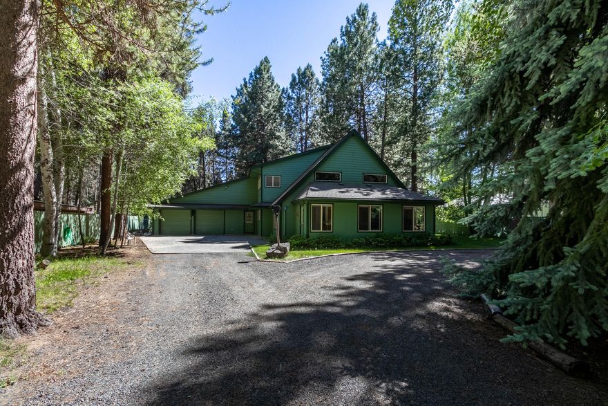 Large chalet style home on the way to Mt Bachelor & the Cascade lakes. Great room with vaulted ceilings and exposed timber beams.  Large gourmet kitchen with an expansive breakfast bar,  lots of cabinet and counter top space, perfect  for entertaining. Two large master bedrooms with updated bathrooms, walk in closets and a sauna. Oversize two car garage with built in cabinets and work benches. Park like backyard has a fully fenced lawn, fire pit, private patio and hot tub.