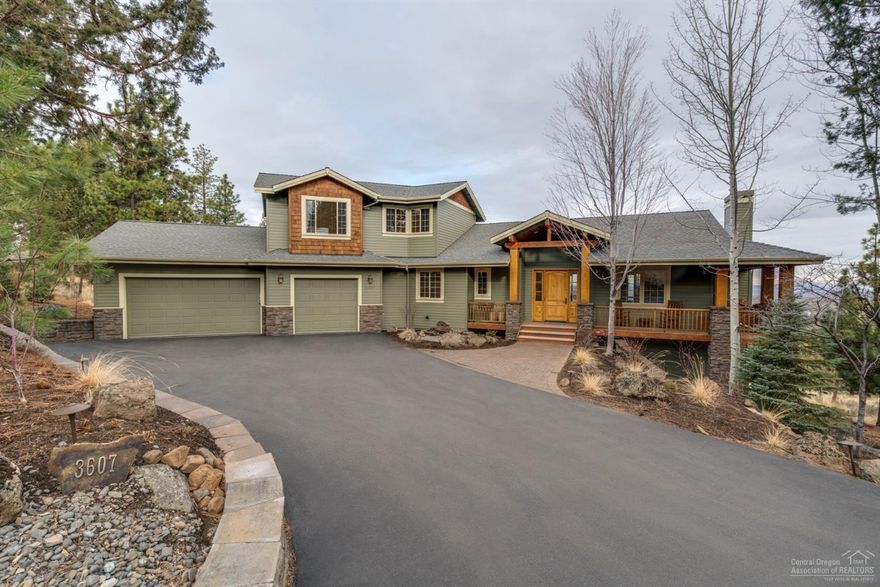 Awbrey Butte retreat on 1.45 acres w/ amazing views from every angle! Extended 3-car garage for your toys. High-end finishes & fixtures around every corner: floor-to-ceiling windows, vaulted wood ceiling, chef's kitchen. Open concept floor plan is an entertainer's dream! Fabulous master suite & don't miss the home theater room. Explore the array of outdoor living areas: view deck, patios, hot tub, fire pit, ultimate privacy & much more! Truly a must-see!