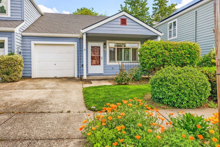 Charming single-story townhome with an open floor plan, vaulted ceilings, and oak hardwood floors throughout. The bright dining area features a bay window, and the kitchen opens to a covered deck—perfect for BBQs with bar table & stools. The primary bedroom includes a private deck surrounded by trees and lush vegetation with mountain views. A brand new Heat Pump HVAC is just installed. Enjoy the convenience of an attached garage with built-in shelving, washer, and dryer. The well-managed HOA ($173/month) covers front yard maintenance and beautifully maintained common areas, including open green spaces, nicely designed quiet walking paths with peaceful mountain views, wetland and guest parking. Ideal for first-time buyers, down-sizers, or investors. Located conveniently in a neighborhood near shopping, the YMCA, and a planned 6 acre city park with direct access. Quick access to I-5 makes commuting easy. Move in ready!