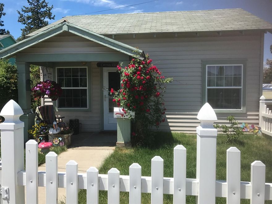 Too cute.Everything is in its place. Two bedrooms and a laundry room that can be turned into a bedroom if put laundry facilities in the partial basement.The detached garage and the extra lot goes with this fun loving home.