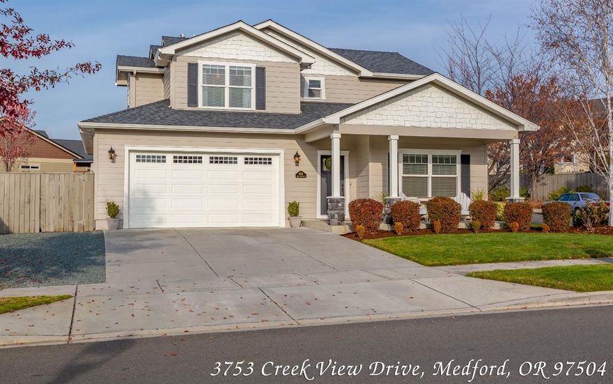 Move-in ready, immaculate cared for E Medford home in Stonegate Estates. Over 2,000 sq ft of living space with gated RV parking, large fenced back yard and three car finished garage. Built in 2006, this 3 bedroom, 2.5 bath home offers vaulted ceilings, a spacious and bright family room, crown moldings, solid hardwood floors and inviting open interior spaces, well-designed custom kitchen w/island breakfast bar, walk in pantry, granite counter tops stainless appliances and rich hardwood floors. Master suite offers coffered ceiling, his and her walk in closets, jetted tub, walk in shower & double vanity. Guest bedrooms and bath are spacious & 2nd floor utility room for added convenience. In addition a new water heater and AC systems, new exterior paint and home surveillance system. Central vacuum, covered front porch & back patio, lush landscaping, raised beds and garden area and outdoor shed. All located in area of established homes in fantastic neighborhood. 3D tour available online.