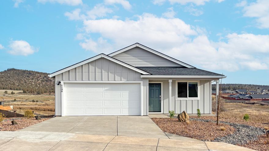 This new construction home sits on an 11,411 sqft lot in Parkview Estates, close to Downtown Prineville for dining, shopping, and entertainment. The Alderwood plan offers single-level living with an open-concept kitchen, dining area and great room. A versatile front bedroom works perfectly as a guest suite or home office, while two additional bedrooms are thoughtfully positioned to the side, including a primary suite with a private en-suite bath and walk-in closet. Interior highlights include quartz counters, shaker-style cabinets, stainless steel appliances, and LVP flooring in the kitchen and baths. The home also comes with central AC, refrigerator, washer/dryer, a xeriscape front yard with drip irrigation, and blinds—all at no extra cost! Homesite #8. Est. completion: Dec. 2025. Rendering is artist conception only. Photos are of a similar home, features and finishes will vary. *Below-market rate incentives available when financing with preferred lender.* Taxes TBD