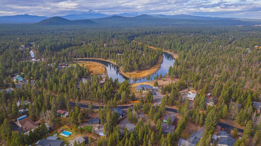 The perfect oasis in Oregon Water Wonderland! Great opportunity for a cute home home on a large lot. Located just a minute ort two from the Deschutes River, the homeowners marina/park and 40 acres of National Forest along the river, this home offers lifestyle flexibility in a package that is greater than the sum of its parts. Perfect for first time home buyers or those wanting to downsize or secure a great Sunriver area get away.

The subdivision has paved roads, water and sewer. The cute and clean main home has a nice open floorplan with the living, dining and kitchen areas flowing out to a nice deck, hot tub and fenced back yard with a firepit. The detached garage also has a unique flex room, in addition to the  parking bay, that isn't included in the square footage. This space is great for a home office, workout room, artist studio or hobby room. Because of the large lot, there is plenty of room to expand the home or build a great shop for all of your toys!