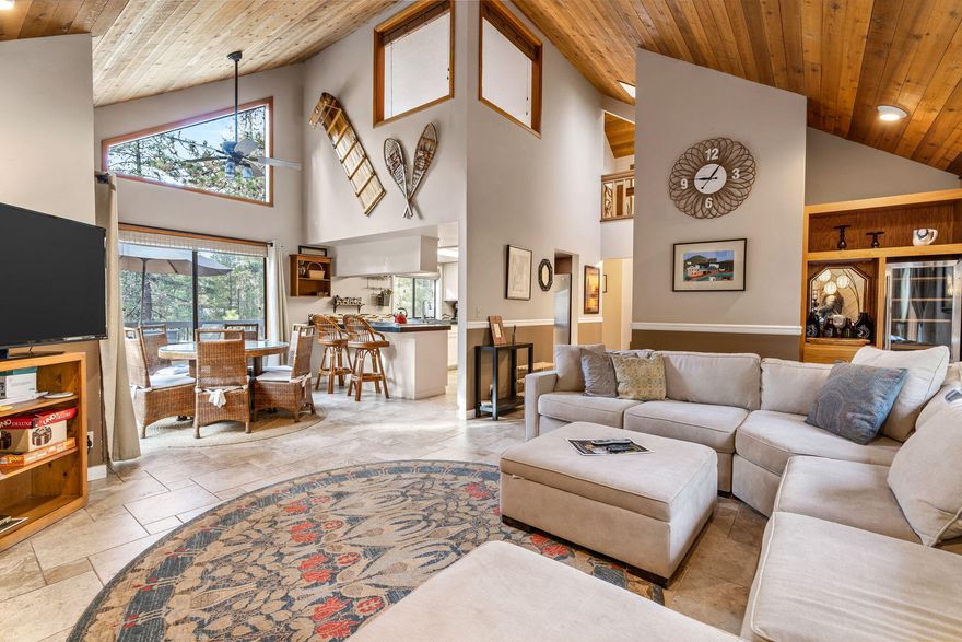 Terrific Sunriver home near SHARC, bike paths and the Village. The main home has 3 bedrooms, 2 full baths with a cozy open living room and dining room with vaulted
ceilings, gas fireplace, and sunny kitchen with lots of storage. Skylights and plenty of windows fill this home with natural light. Sweet front porch to enjoy watching the
wildlife and back deck wraps around the home offering plenty of space to BBQ, lounge, star gaze and enjoy the private hot tub. There's also a nice grassy lawn off the   added privacy. Above the two car garage discover a one bedroom, one bath 406 sf ADU with private entrance. This space could add to rental income potential or be a
perfect owner suite. Comes fully furnished, with all kitchen appliances and washer, dryer. Property has strong rental history.