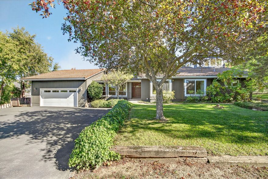 Enjoy a wonderful sense of privacy on this incredible half acre lot with views in all directions! Gracious home with an open floor plan and everything you need on one level. Large kitchen area opens to the living room with high vaulted ceilings and lots of windows to enjoy the outdoor scenery and abundance of natural light. There's a sunroom off of the main living area with access to the large deck overlooking the backyard and views afar. Approx. 2339 SF, three bedrooms and two full bathrooms. Spacious primary bedroom suite has an office area and stairs leading to a very cool view tower above. The two additional bedrooms share the guest bathroom. Home has a tile roof and the exterior was recently painted. The grounds are beautifully landscaped with mature plantings yet have plenty of room for all your gardening needs and personal vision. Located in a great neighborhood on a dead-end street with no thru traffic and conveniently close to shopping, city services, and easy access to I-5.