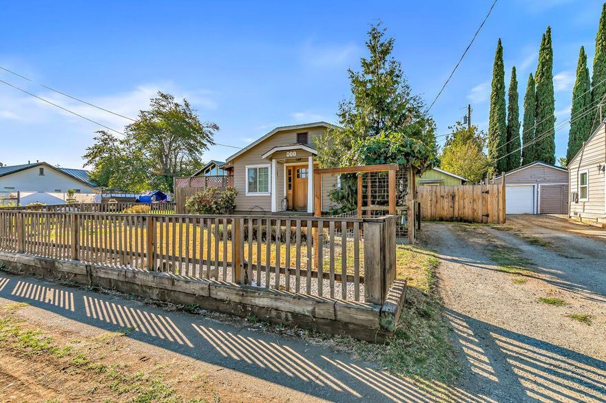 Adorable 2 bedroom, 2 full bathroom home conveniently located in Medford! Cozy living space with hardwood flooring, woodstove, and an efficient kitchen. Unlike most homes of this size, there is a vast laundry/utility room with tons of additional storage and a master suite which includes the second bathroom and large closet. Outside, you'll find the covered patio area perfect for entertaining, as well as an immense backyard with storage shed.