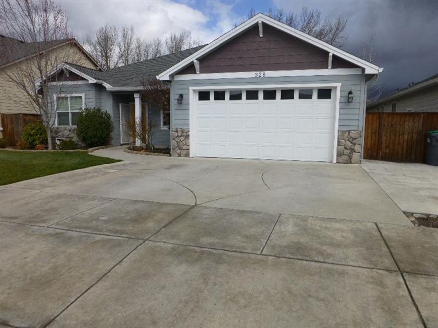 Beautiful open and spacious 2005 built Craftsman Style home on a quiet cul-de-sac in Talent, with 4 very spacious bedrooms, 2 full bath, plus bonus room (could be den, bedroom), 2357 Sq ft, vaulted ceilings, Hardwood floors, Kitchen offers ceramic tile flooring, granite counter tops, stainless steel appliances, skylight, and work station, Large family room with gas fireplace, big master with walk in closet, nice laundry room, new hot water heater, over sized patio with hot tub and lots of room for gardening, seller has added lots of concrete for easy maintenance...looks clean and sharp! A must tour.