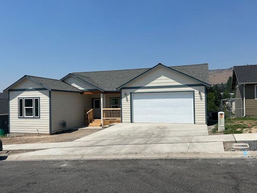 New construction located in a newer subdivision! Featuring an open floor plan with 3 bedrooms, 2 bathrooms, and 1668 sq.ft. Home features custom wood cabinets, stainless appliances, large laundry room with pantry, and some vaulted ceilings. Nice primary suite with big walk-in closet, soaking tub, and double sink vanity. Laminate floors throughout with gas forced air heat and AC. Great deck and  views of Hogs Back. Home will be fenced with no landscaping.