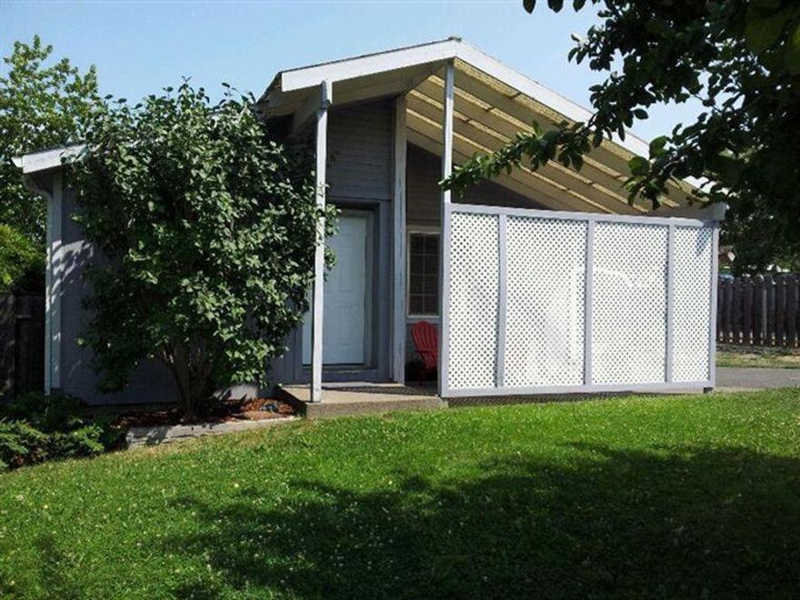 You'll love the spacious feeling of this single level well-built manufactured home on a continuous concrete foundation in a nice neighborhood. This light and bright home has an open floor plan with vaulted ceilings. Enjoy your morning coffee or late afternoon glass of wine on your private patio. Garage and carport. The hiking/biking trails are easy access for the outdoor minded. Close to amenities and YMCA. This home can be traditionally financed. Home Warranty included. Don't miss this gem!!
