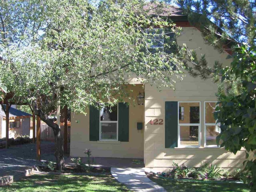 Fabulous Remodel On This Traditional Downtown Gem! 3 Bedrooms, 1 Bath, Completely Remodeled. Beautiful Hardwood Floors Throughout, Hickory Kitchen Cabinets, Wonderful Paint Colors. Tile Floors In Bath With Tile Surround In Shower/Tub. 2 Bedrooms Up And 1 Down. Nice Yard With Room For Personal Touches, New Deck Off The Back Porch For Entertaining, Fenced Backyard. 1 Single Carport On The Side Of The Home. And A 2 Carport Behind The Home. This Is A Must See! Just Move In!