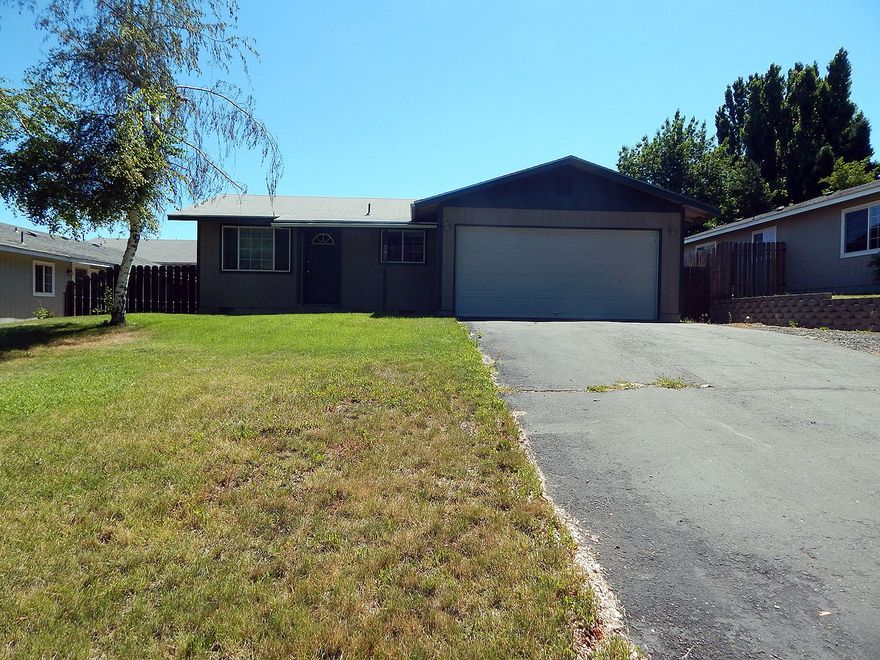 This lovely home located on California ave has been well maintained, laminate flooring carpet, and vinyl. Natural gas heat, lovely fenced backyard with patio, Extra parking on the side of the home, close to OIT and Harbor Isles Golf Course. Easy to show.