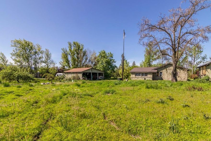 Amazing 2 tax lots totally 1.75 acres, with SFR 10 zoning could be 2 separate homes, build on one lot and sell the other, or possibly subdivide for new construction SFR or more. One lot is .28 acres and the other lot is 1.47. There is a small 3b/1b cottage that has no value and is occupied so please make appointment to tour. Per Medford City Planner this property could be up to 11-18 lots depending on orientation and lot size. Buyer to due own due diligence with City of Medford and Jackson County on specific uses and costs. Cash or construction loans only. No owner carry available. Back on market, no fault of property. Needs 4 to 5 day notice to show property.