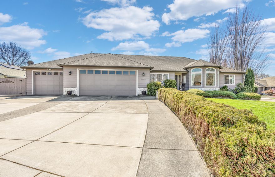 Look no further, this home is it! 4 car finished garage w/HVAC. Paved & gated RV parking approx. 60' X 20'. Southern exposure in backyard w/views of the Mts & Centennial golf course. Covered back patio, fenced backyard.  Lg windows & high ceilings. Lg kitchen w/5 burner, gas cook top & convection oven, deep storage in pantry.  Refrigerator, washer & dryer are included. Updated bathrooms w/flooring, lighting, sinks, counters & handles. Dbl sinks in master w/lg shower, walk in closet & slider to covered patio. Split floor plan. Formal dining rm & beautiful living rm w/ views of nice landscaping, family rm opens up to kitchen, breakfast rm & slider to backyard with garden beds, planting pots w/ timed sprinklers system front & backyards, storage sheds. Pride of ownership shows. Newer Roof & gas water heater. Lg laundry rm w/great storage & cabinets. Full RV hookups.