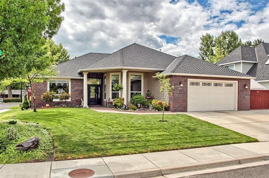 Enjoy the peaceful feeling of country living and the convenience of being close to town in this beautiful one level 3 bedroom, 2 bath home plus an office. It features hardwood oak flooring in the entry, kitchen & nook. 13' coffered & lighted ceilings, beautiful cabinets & wood accents throughout. Tile flooring in the baths & utility room. The master suite has a large walk-in closet, granite shower & jetted tub. Jenn-Air stainless appliances, leaded glass throughout, and a central vac system. 50 year comp roof, over sized 2 car garage, and a 12'W x 30'D gated, concrete, parking area on side of home for small RV, boat or trailer. Located on a nice corner lot with beautiful fountains in both front and back yards.