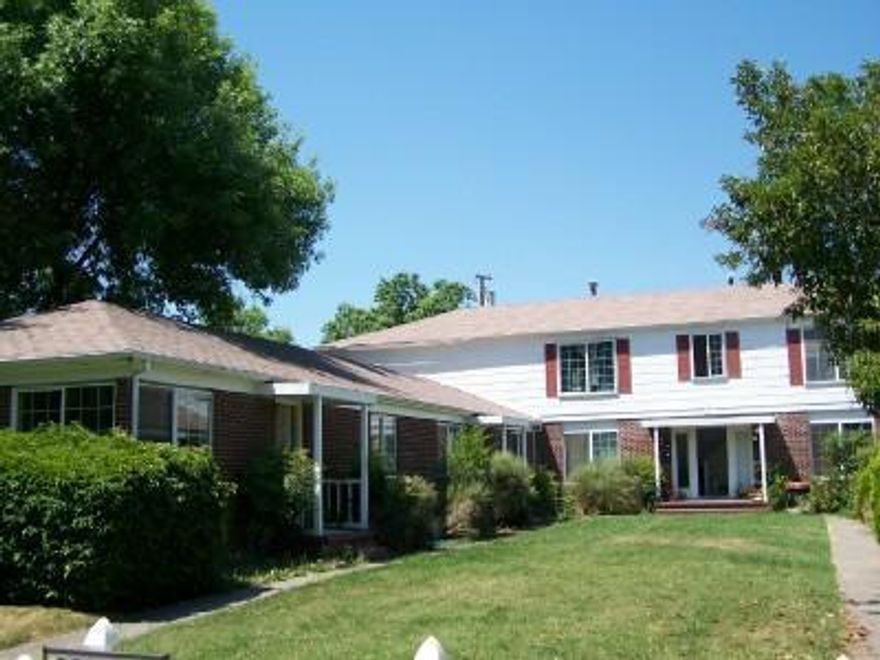 Attention Investors! Excellent income potential with this eight-unit apartment complex. Each unit has a convenient floor plan, two bedrooms, hardwood floors and Vinyl double-pane windows and separate electric and gas meters. Attractive brick front building with appealing common grounds and common laundry room. Property to be sold in As Is condition including all appliances, window coverings, laundry machines, etc. Owner may carry. Buyer to do own due diligence.