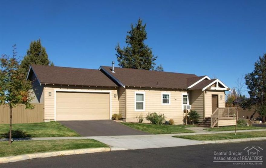 Very popular NE Bend neighborhood & a rare double corner lot. This home features an open floor plan with vaulted ceilings, gas fireplace, extra wide garage with built in storage & a fully fenced private .15 acre lot with 2 patios. The back & side yards are combined for an extra large outdoor area. The front door has a nice entryway with room for shoes & coats. White kitchen appliances, SS sink, vinyl & carpet flooring & Formica counters. Only 2 homes on this street. A must see!