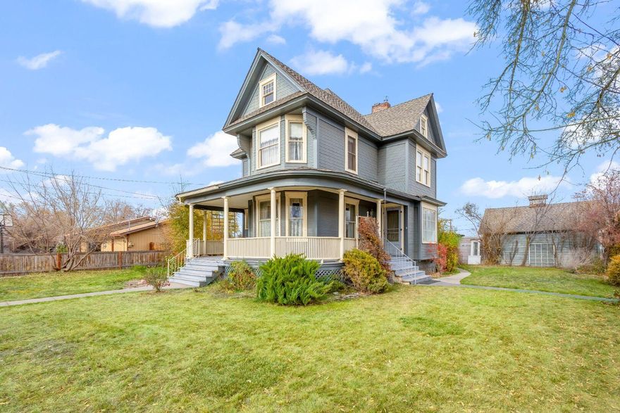Historic 1908 ''Elliott House'' built by Jack Shipp is one of Prineville's best preserved Queen Anne Victorians. Formerly used as bed & breakfast, could easily be
used in that capacity again. It sits proudly on a large corner lot just blocks from downtown. A grand covered wraparound porch with stately pillars welcomes you into a home filled with original character: weatherboard siding, large wood windows, antique knobs & beautiful hardwood floors. Inside you'll find high ceilings, custom
fireplace mantel w/built-in mirrors & charming built-ins throughout. The main level features a spacious bedroom & bathroom w/antique vanities, while upstairs offers 3 generously sized bedrooms & a wood staircase full of period detail. A second staircase leads to the large attic (not included in sq. ft.), perfect for a bonus room or studio. Outside, enjoy mature hedges for privacy, detached garage & multiple historic outbuildings. Truly a rare opportunity to own a piece of Prineville's history.