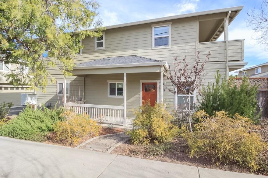 Prepare to be impressed with this lovely unit in desirable Ashland location, close to town, park and railroad district. Main level has open floor plan w/kitchen having beautiful wood cabinets, granite counters, built in appliances and island/breakfast bar w/3 bar stools which are perfect for gathering & entertaining while enjoying gas fireplace. Small easy maintenance fenced yard off living room. Bamboo flooring accents the main floor. This front unit is bright and offers plenty of natural light. All bedrooms are nice size with master having walk in closet, balcony with mountain views, tiled tub/shower combo and double sinks. Plenty of storage though out. There is a Sol-Reliant energy efficient solar assist water heater system along with the energy saving benefits of dual zone heating/cooling system. Washer, dryer and refrigerator are included in sale.