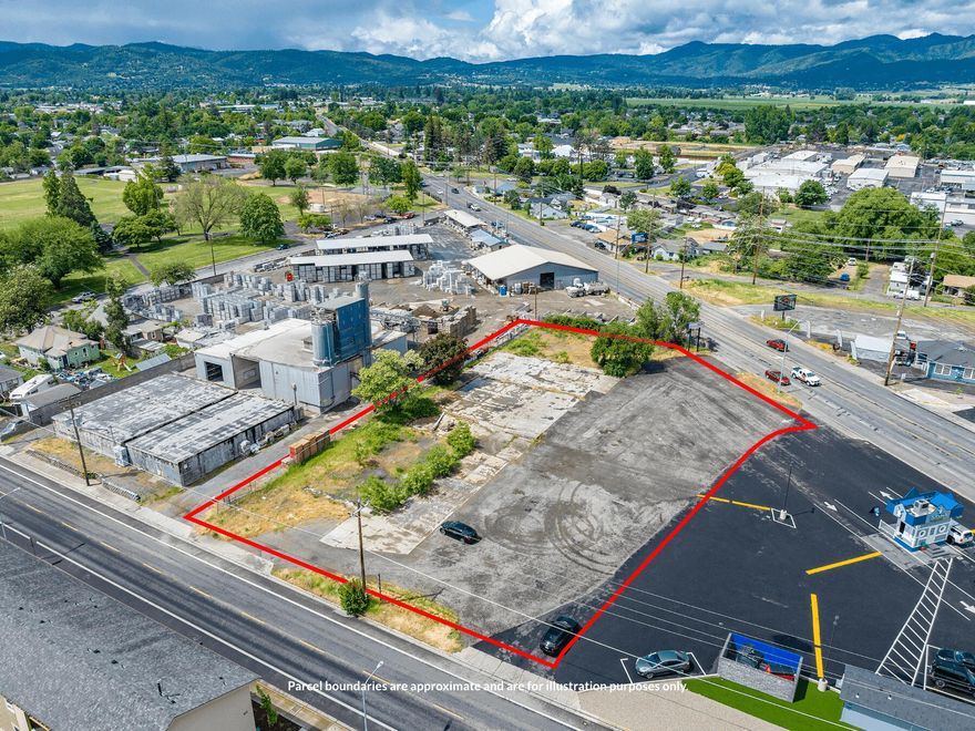 Exclusively presented for sale - 943 Summit Avenue, a rare infill development site in a high-traffic corridor of Medford, Oregon! One of only a handful of highly-visible, easily accessed development sites remaining in Medford, 943 Summit Avenue presents a flat, usable site for a variety of users. The site enjoys unimpeded visibility from a combined 36,000+ VPD, and owns all or part of 4 dedicated left/right driveways. While currently zoned Light Industrial, the site is ideal for a retail, automotive, or similar use; LI zoning allows for several special use allowances - buyer to confirm. All utilities are either stubbed or very close at the street. Numerous ground-up projects from apts to gas stations have been built nearby the site - one of a few centrally-located, flat, buildable parcels in a growing area! Contact brokers for more info. Buyer to complete all due diligence.
