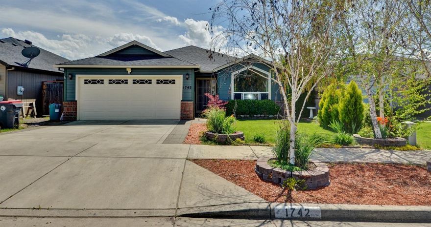 This lovely home has great curb appeal with mature landscaping, flowers, and Japanese Maple. The home is well insulated and the floor plan is open featuring vaulted ceilings, granite counters in both the kitchen and the large bathrooms. There is a tile entry-way. The kitchen, dining, and hall are hard-wood. The wonderful kitchen boasts gorgeous granite counters, custom cabinetry, designer lighting, pantry, and eating bar. There is a large private master suite that has ample walk-in closet, private bathroom with granite and matching cabinetry. There is a also door off the master out to the large covered patio. The laundry room is large and also features tile flooring. The two car garage is finished. In the back-yard you will find privacy and plenty of room! The backyard is fully fenced and has a huge covered patio, pergola, fire-pit and a hot-tub with nice covered gazebo. The seller is providing the buyer with a 1 Year Home Warranty provided with Fidelity National Home Warranty.