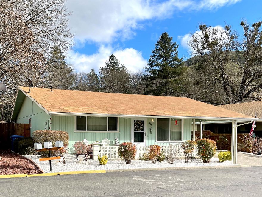 Come see this beautiful home in Brookside Village 55+ community! This charming home has been well cared for. Its open floor plan is warm and welcoming. The Kitchen has a pantry and a brand new dishwasher. (All kitchen appliances +washer and dryer included.)
Both Bedrooms here are spacious; the primary bedroom has an en-suite bathroom and slider access to a pretty patio and beautifully landscaped yard; enjoy your morning brew with mountain views. The atmosphere is elegant and serene here. 
Has sprinkler/drip system and new cedar fencing.

Brookside Village offers a Clubhouse with its own kitchen, a pool table, BBQ area, Swimming Pool, Guest Parking + two small parks for relaxing and walking pets. RV/Boat parking also available.   $102/mo HOA includes water and sewer.  Shopping and restaurants are nearby for your convenience.
Home Sweet Home!