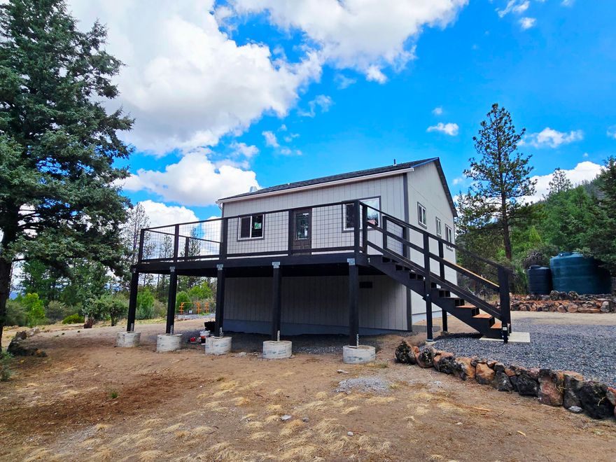 *Permitted New Construction* Nestled in the serene rural community of Beatty, Oregon, this 1.98-acre fully fenced property offers endless potential. Construction has already begun with permits & inspections, leaving the opportunity for someone to step in and complete the process. Many things the seller has already done! 3/4 minus driveway. Clearing has been done with views of the mountains and canyon. There are 2 holding tanks 3,000 gallons and 500 gallons, to the right of these is a small potato patch. This property has a woodshed and green house with garden boxes. The house has a stem wall, trusses, windows & doors, the house has been wrapped with vaporlock and there is a moisture barrier under the home. There is a 1,000 gal. septic tank and plumbing from tank to the house has been laid. Deck and railings are installed, siding and roofing is completed... Now its time for the inside!!