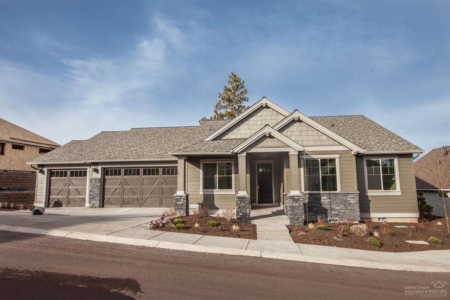 Pahlisch Homes new construction in the River's Edge Phase 17, with views and backs to the golf course fairway #1. Pahlisch custom quality finishes throughout include inviting entry into great room, coffered ceiling, large windows providing lots of light, quartz counter tops, SS appliances, engineered hardwoods, walk-in closet, and much more.