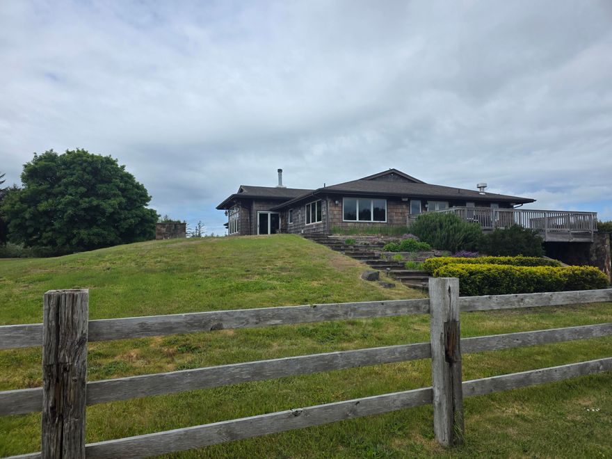 The 4600 sq ft Tagg Ranch main residence, built in 1985 and remodeled in 2003, has 3 beds, 4.5 baths, custom cabinets, white oak flooring, a natural gas stove, and two fireplaces (one gas, one wood-burning). It offers covered parking for four vehicles (2-car garage, 2-car carport), city water, septic, and a 2-year-old furnace. A second dwelling (2004) has 3 beds, 2 baths, a detached carport, a natural gas fireplace, a gas stove, a sunken master tub, and a new water heater. Outbuildings include a hay barn, workshop, horse barn, a third house (needs demolition), woodshed, machine shed, grain bin, an above-ground diesel tank, three new wells (at hay barn, shop, and horse barn), working corrals, and a squeeze chute. The ranch is 10 miles from two hospitals, originated as a Land Donation Claim, and was acquired from the Tagg family. It boasts stunning beach and coastline views, abundant wildlife (Roosevelt Elk, Blacktail Deer, Black Bear, waterfowl, eagles), clam digging.