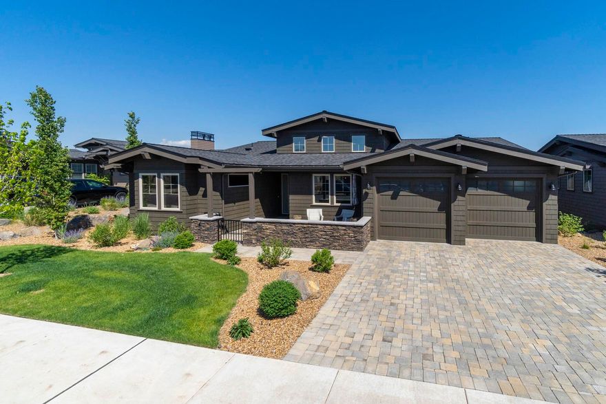 Welcome to luxury living in Tetherow with incredible views and sophisticated finishes. As you walk through the front door, you're immediately met with soaring ceilings and an open floorplan with expansive windows which perfectly frames the snow capped mountains and Tetherow golf course. This home has great main level living with 3 suites and an office/den on the first floor, and 2 additional bedrooms and extra family/media room with barn door downstairs. The kitchen does not disappoint and showcases stainless steel Thermador appliances, a neutral and elegant subway tile backsplash, quartz counters and a generously sized island
with granite countertops. The main floor includes a spacious great room and dining room with sliders leading out to a corner deck with fireplace for staying warm as the sun goes down over the Cascades. This home truly allows you to take in the incredible views from one of the patios/decks of from the comfort of this classy and well appointed home.