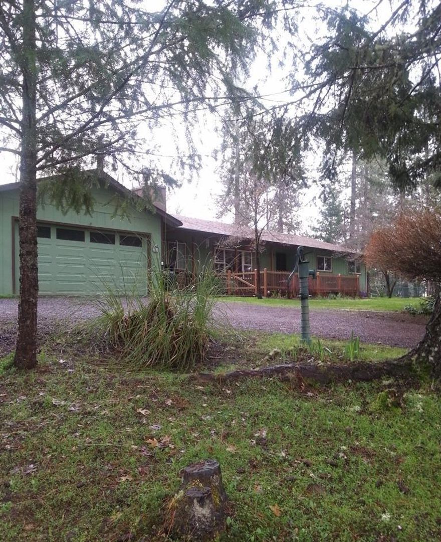 End of the road peace and quiet. Adjoins acsres of BLM land makes it easy to go for a hike. This 1975 Ranch style home has had most of the remodeling done. Since 2013 recent upgrades include windows, roof, heat pump, laminate floors throughout and a remodeled hall bath. As for the property, the irrigation system has been upgraded too w/new sprinklers added & drip to the garden & back yard. The fence around the house is 6 ft. chain link. The new 5 ft. two rail fence with wire now encloses the whole property. There are two gates (12' & 14') on a circle driveway, the gates are chain link, powder coated and are mounted with block hinges, ready to add electricity to them. Connecting the house and the garage is a 250 square ft. breezeway also w/ new double-pane windows. There is a new sunny patio out back next to the spa. At the end of the house are several raised beds, fruit trees, greenhouse and at the top corner there is a 10' x 10' shed. Home is wired for generator (inc.)RV parting too.