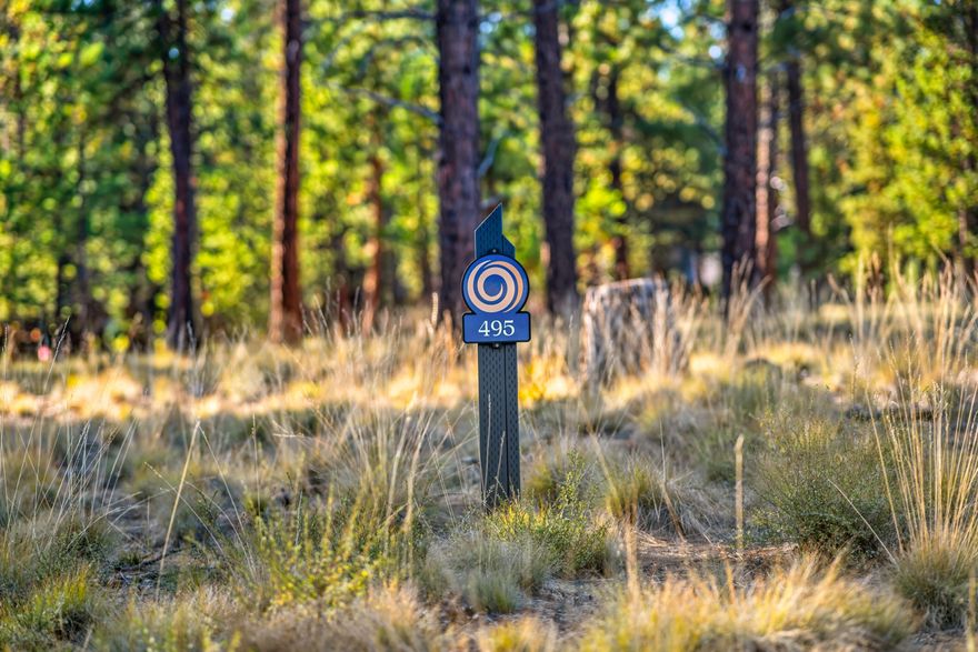 Discover the unmatched lifestyle of Caldera Springs with limited-time special pricing and exclusive incentives on select homesites in our newest phase. Incentives are available for homesite purchase contracts written by December 31, 2025. Take advantage of 5% off list price and Developer paid HOA dues through December 31, 2026. Homesite 495 is a  premier lot offering a stunning blend of natural beauty, pine-filled landscapes, and endless blue skies.  The central location of this lovely .32 acre homesite provides ideal access to both the Lake House and Forest House.  Backing to common area and near the stunning Lava Springs Lake, this lot provides a serene setting for building your custom home. Owners enjoy special access to the Forest House Amenity & Aquatic Center along with golf, fitness, pickle ball, tennis, pools, kayaks & paddle boards. Caldera Springs is located near Sunriver, just 15 minutes to Bend and 30 minutes to world class skiing at Mt. Bachelor. Taxes TBD.