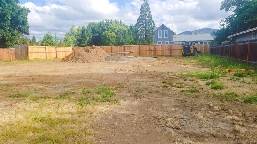 Nice Duplex Lot situated in area of many beautiful homes and duplexes. Access by existing paved Drive way for 1007 Garfield Street, Medford, Oregon. Property has city sewer and water installed to lot. Property was recently partitioned from adjacent large property and closing is subject to recording of the final plat which is in process and should be completed within several weeks. Seller is related to Broker.